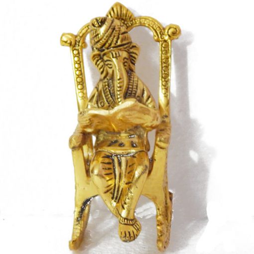 Ganesh on Rocking Chair with a book showpiece